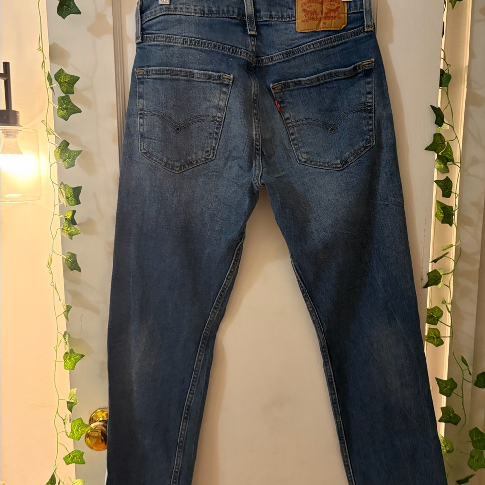 Levi's Women's Vintage high rise medium wash blue  tapered jeans